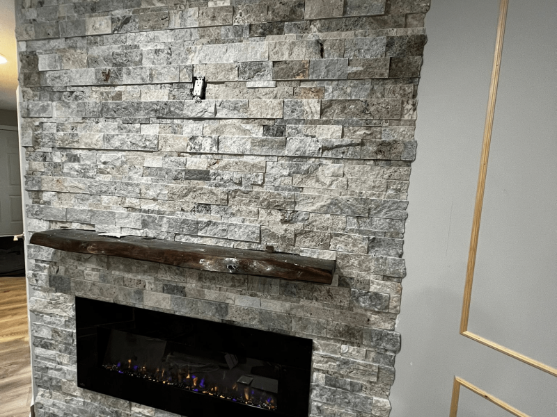 ompleted basement finishing project by Mo Reno in Ottawa, featuring a modern entertainment area.